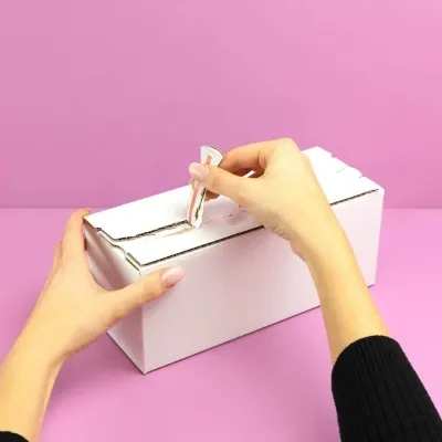 Versandkarton mit Aufreißperforation Versandkarton mit Aufreißperforation