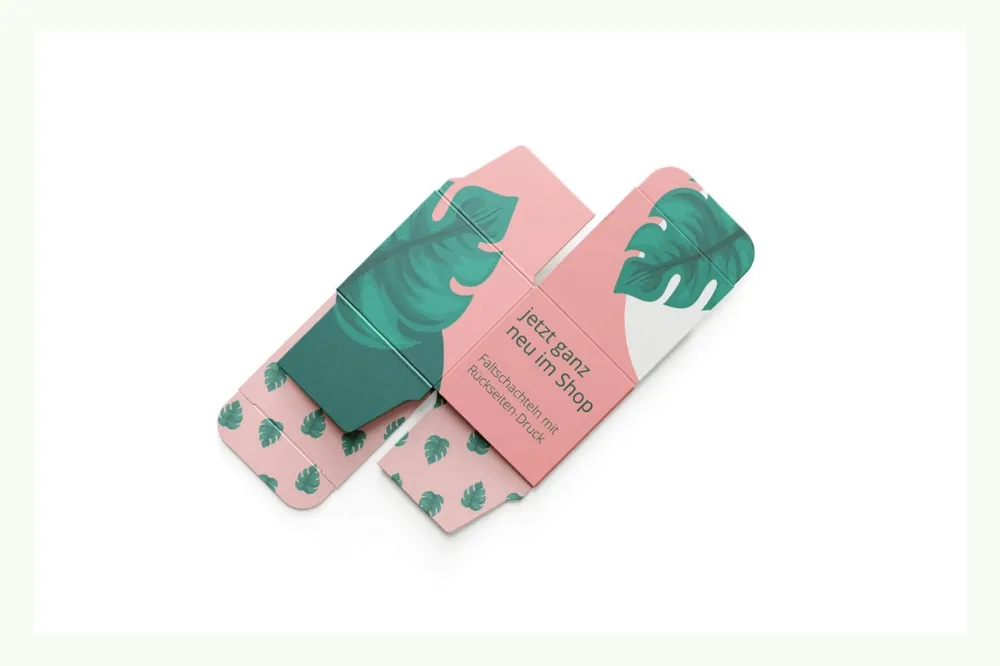 Colourful folding cartons with leaf design in pink and green Colourful folding cartons with leaf design in pink and green