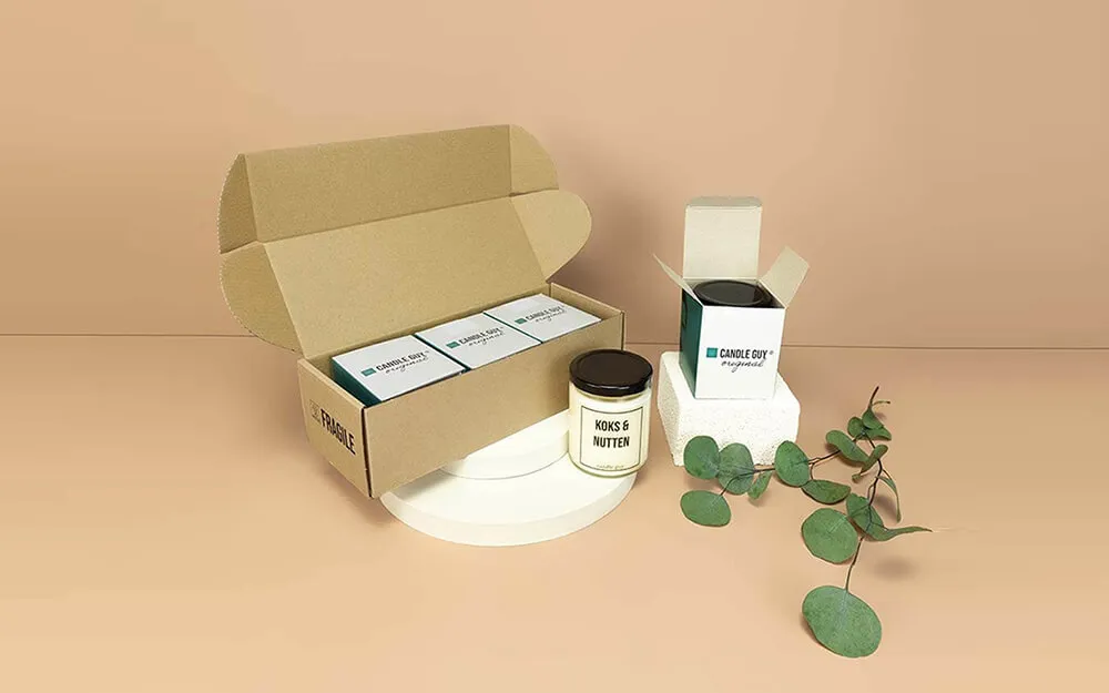 Versandkarton und Faltschachtel für eine Produktreihe Versandkarton und Faltschachtel für eine Produktreihe